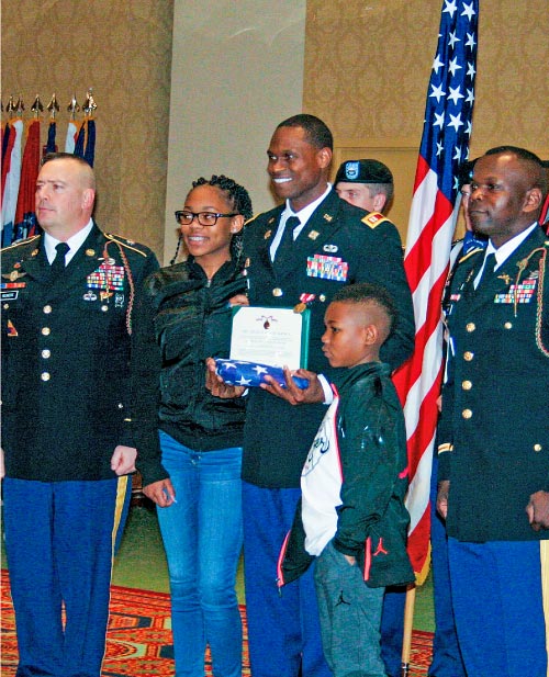 Ricky Manning and his children at his retirement ceremony
